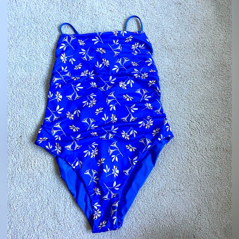 Blue onepiece bathing suit with flowers printed